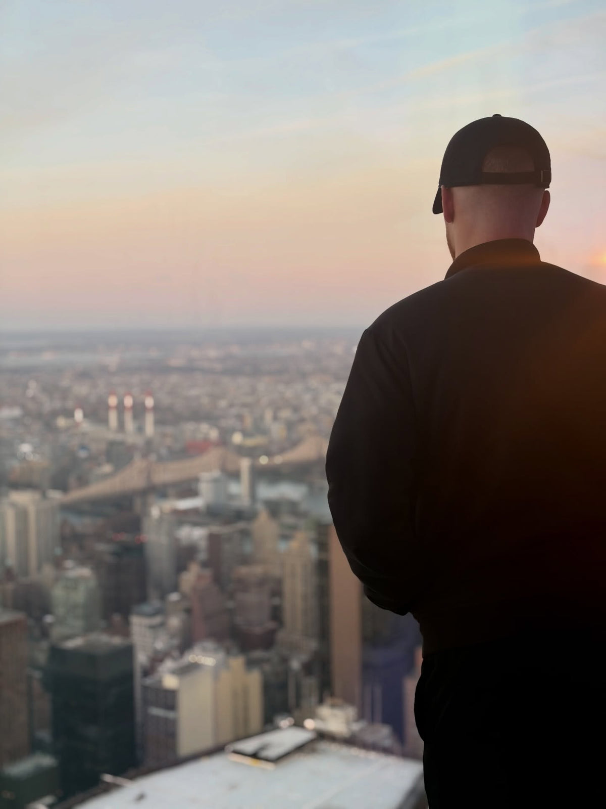 Nate looking out over the city skyline